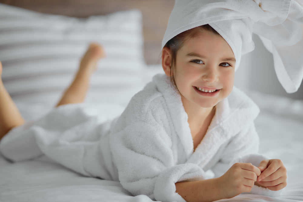 Hotel children's amenities featuring childrens bathrobes