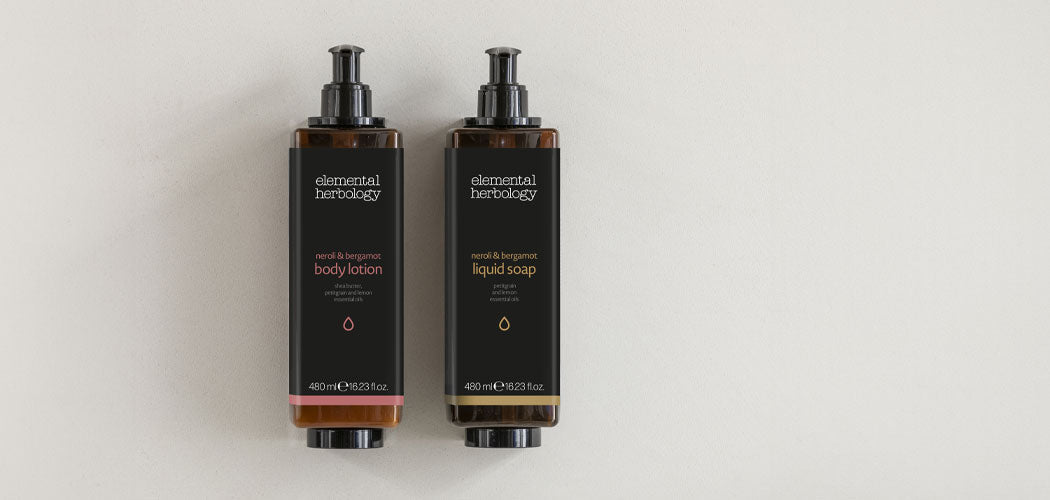Hotel toiletries elemental herbology pump dispenser bottles
