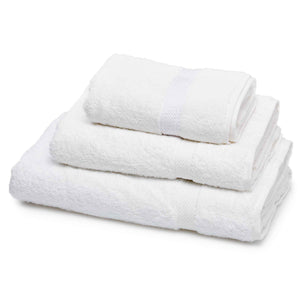 Stack of 600gsm white hotel bath and hand towels