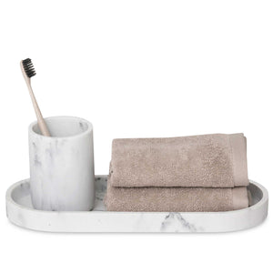 Bentley Azul white marble medium amenity tray with face cloths, toothbrush and Toba amenity jar