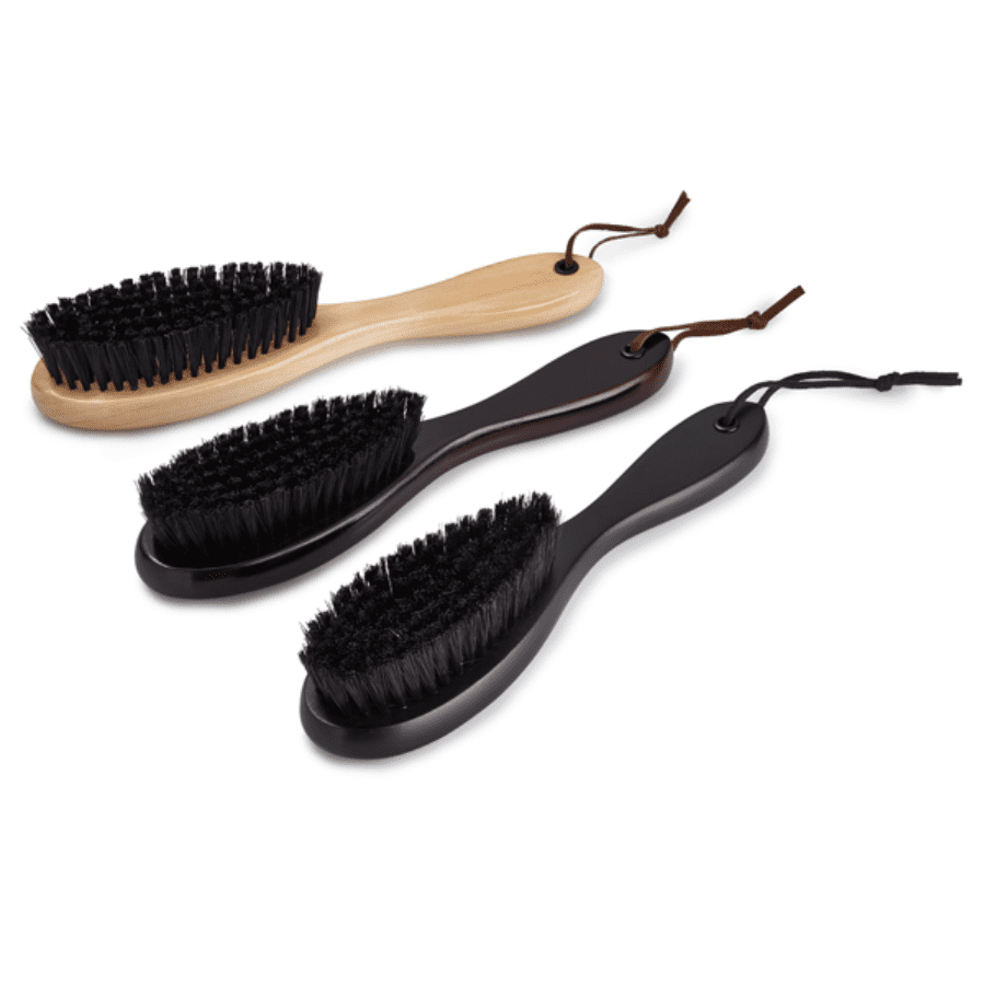 Wooden clothes brushes in natural, mahogany and black
