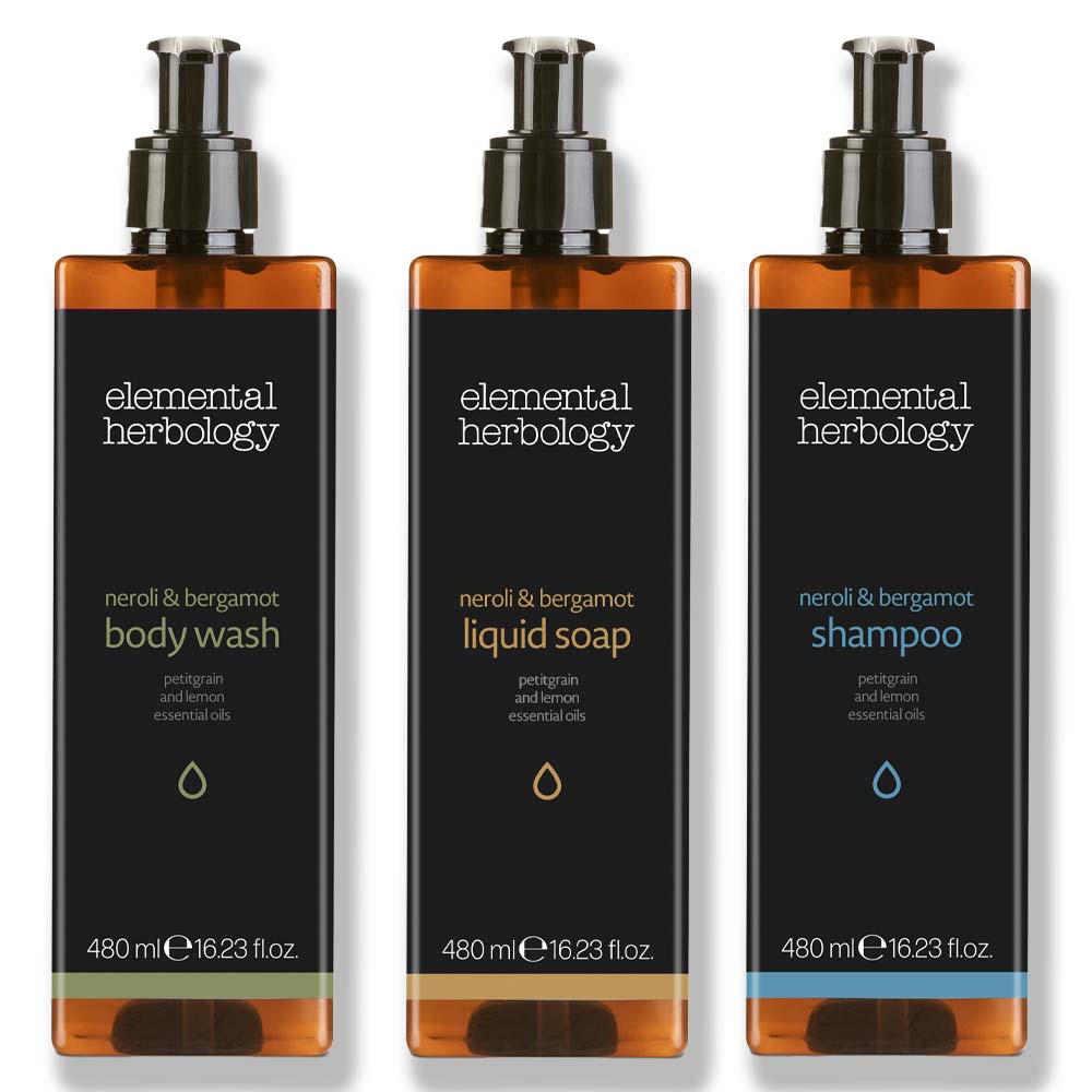 Elemental Herbology pump dispensers collection featuring body wash and shampoo