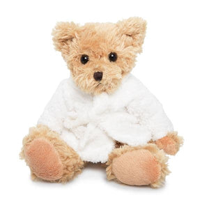 Teddy bear dressed in hotel bathrobe