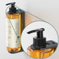 Prija pump dispenser in black anti-theft bracket mounted to wall