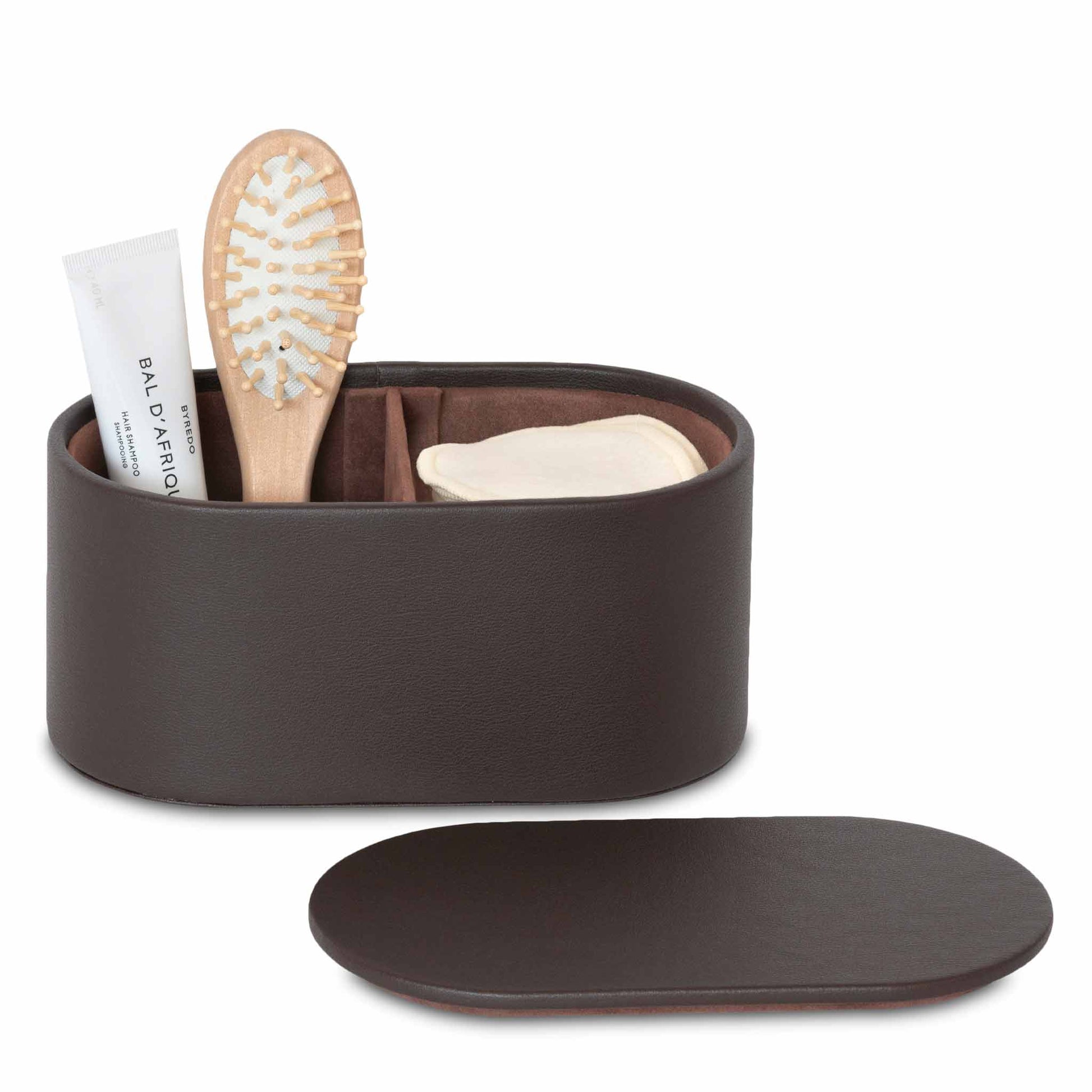 Bentley Bahia brown leather amenity box with lid off and hairbrush inside