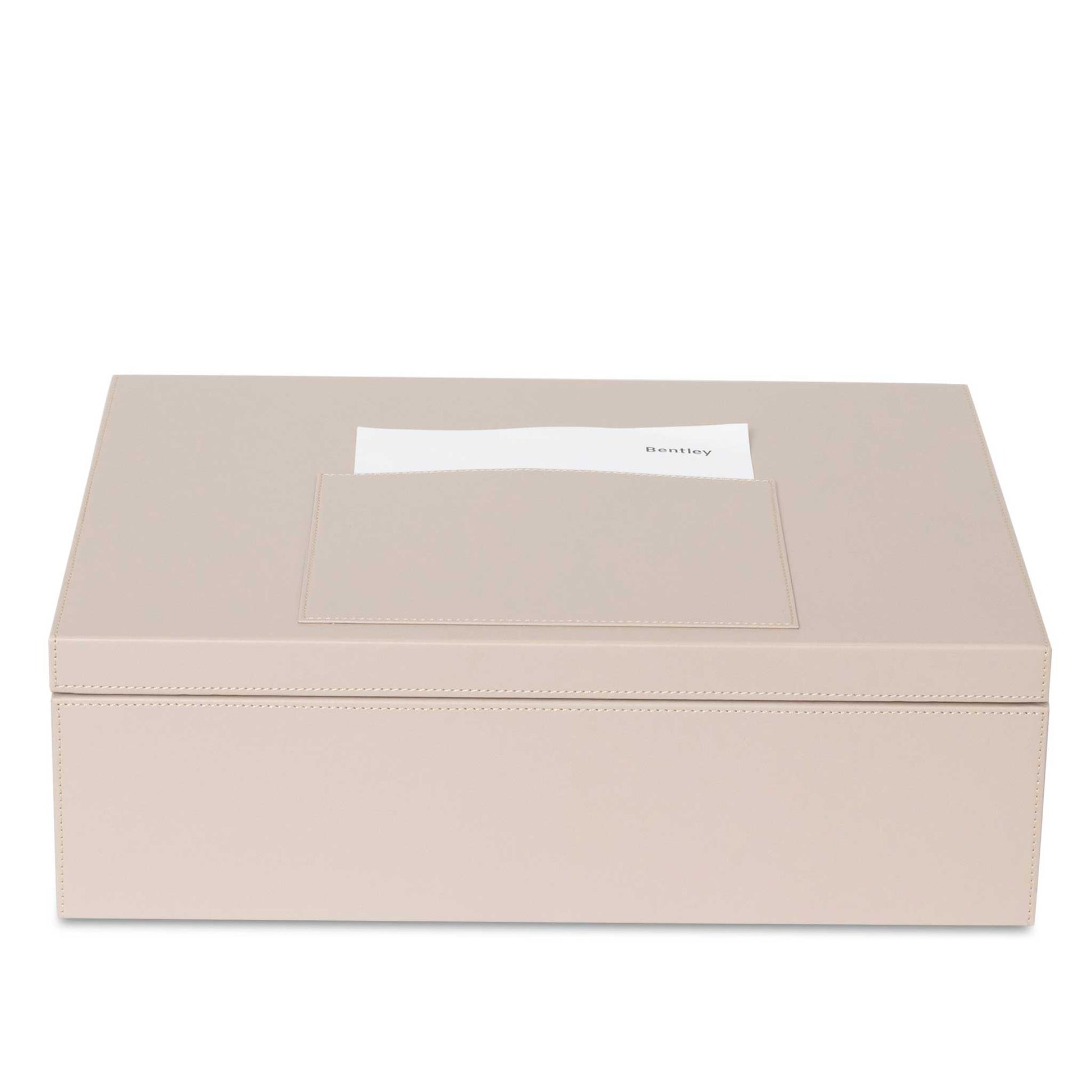 Bentley Capri natural PU leather laundry box with box closed and name tag on top