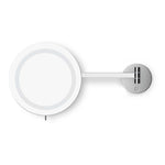 A modern wall-mounted magnifying mirror with a circular white illuminated faceplate and a silver adjustable arm ending in a round wall mount, shown against a plain white background.