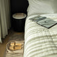 Bentley natural Flores turndown tray lifestyle image in hotel room