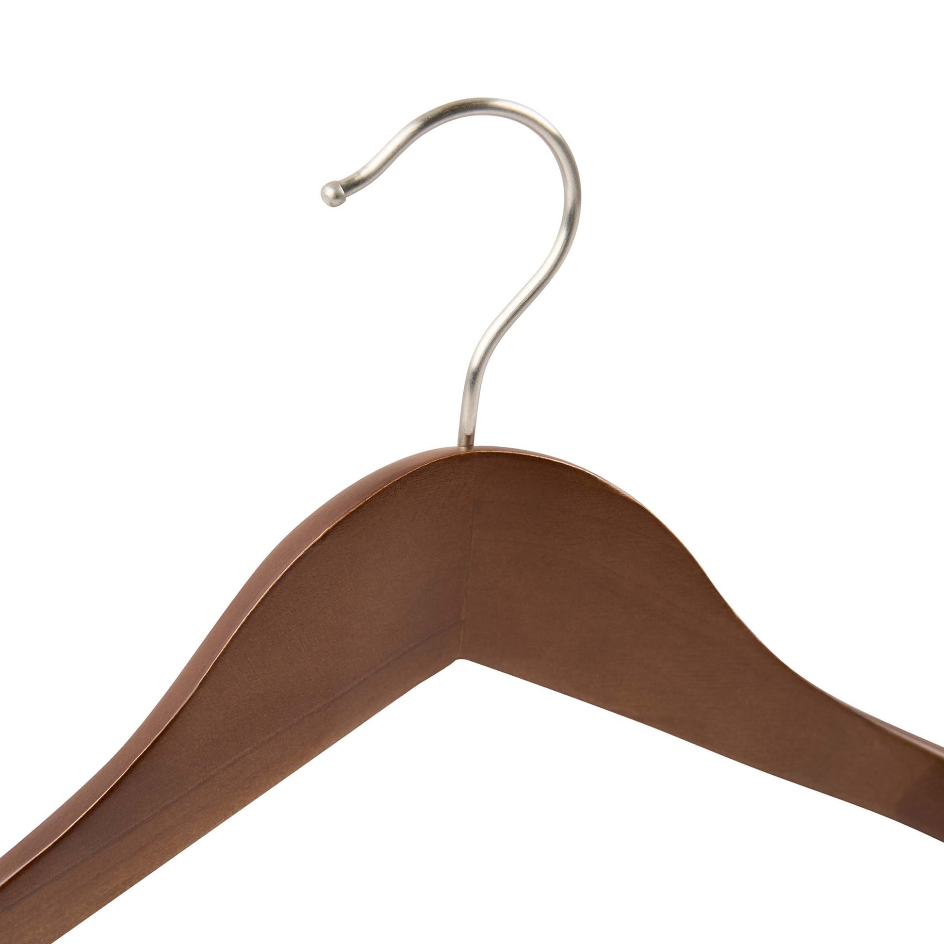 Close-up of Corby Clifford dark wood hotel hanger with durable chrome swivel hook