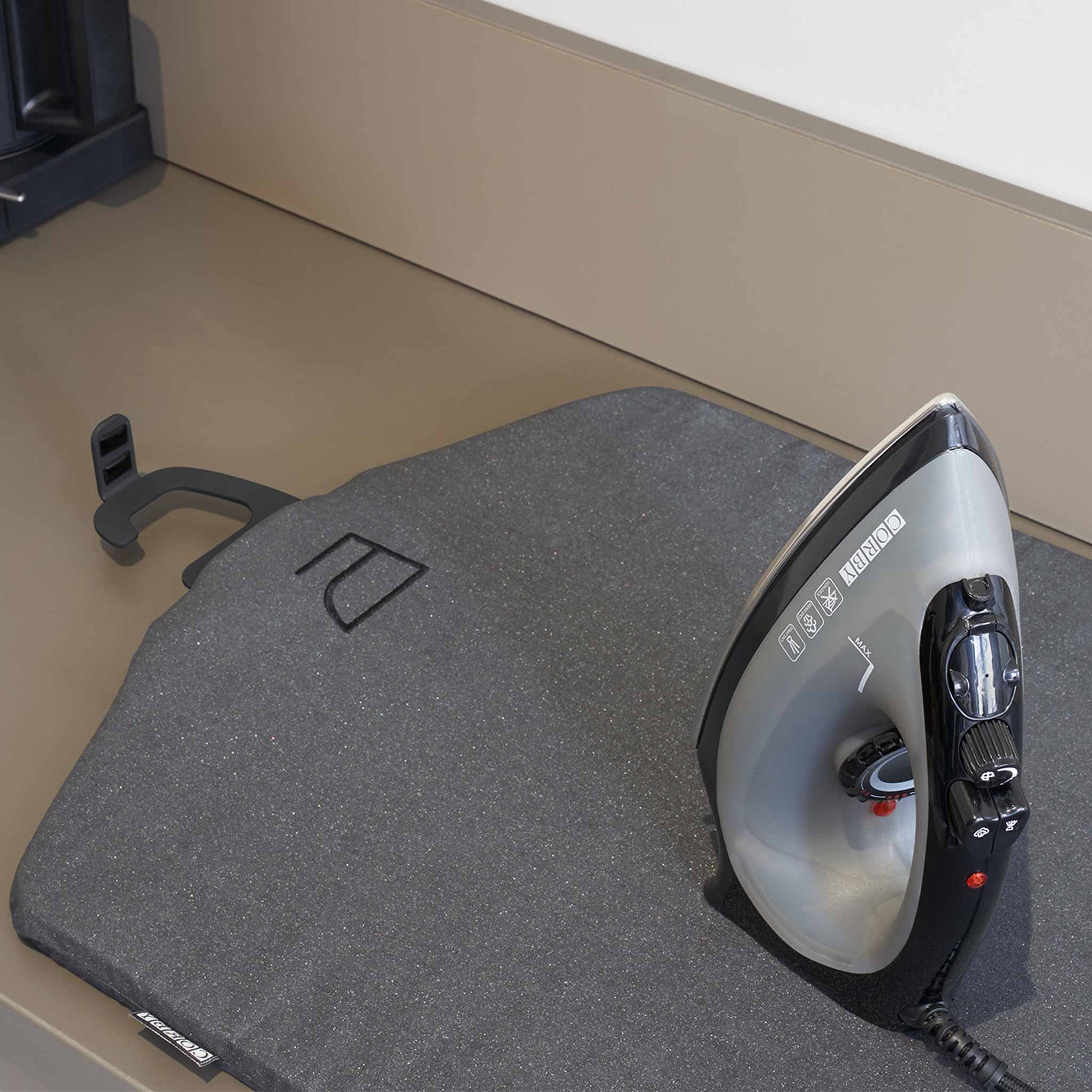 Darlington mat used as ironing board with with hotel iron
