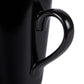 Close-up of the Corby Fenton black ceramic mug handle showcasing smooth ergonomic design for comfortable grip