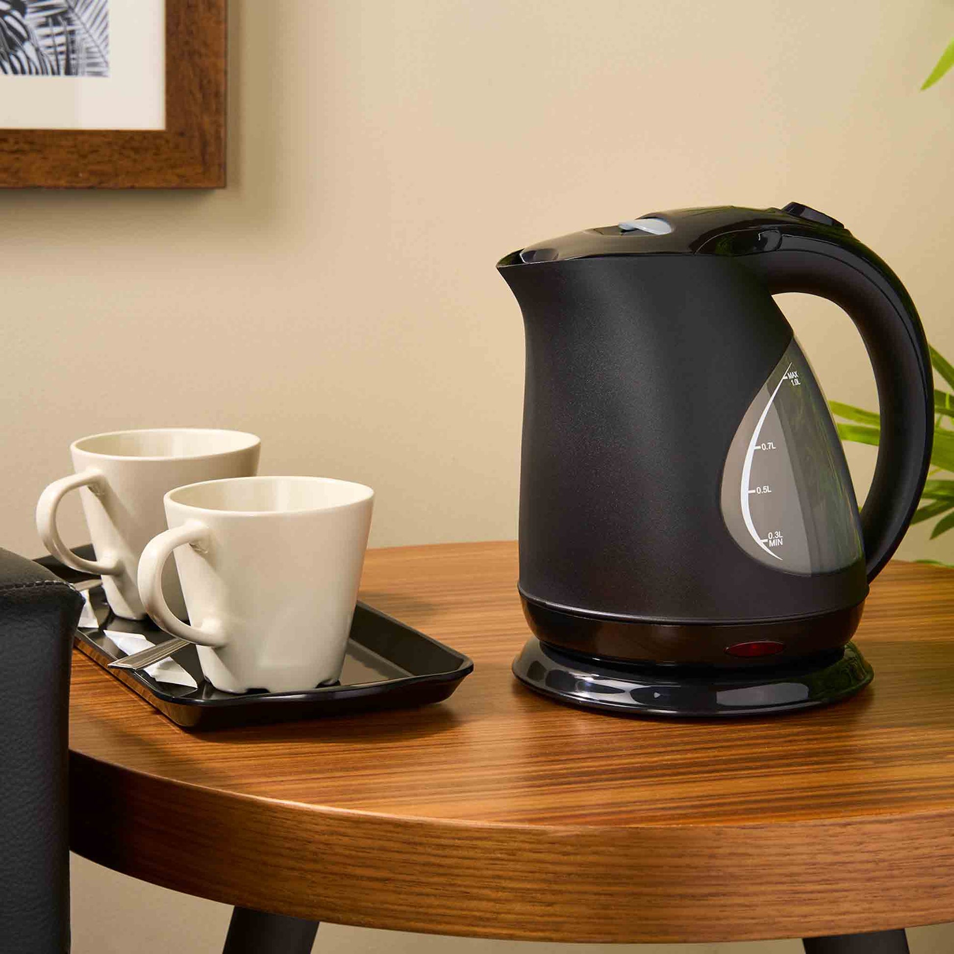 Corby Lancaster 1 Litre Black Kettle with twin ceramic mugs on hospitality tray in hotel guest room setting