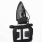 Angled close-up of Corby Sherwood wall-mounted holder storing 1200W steam iron with coiled cord and folded ironing board