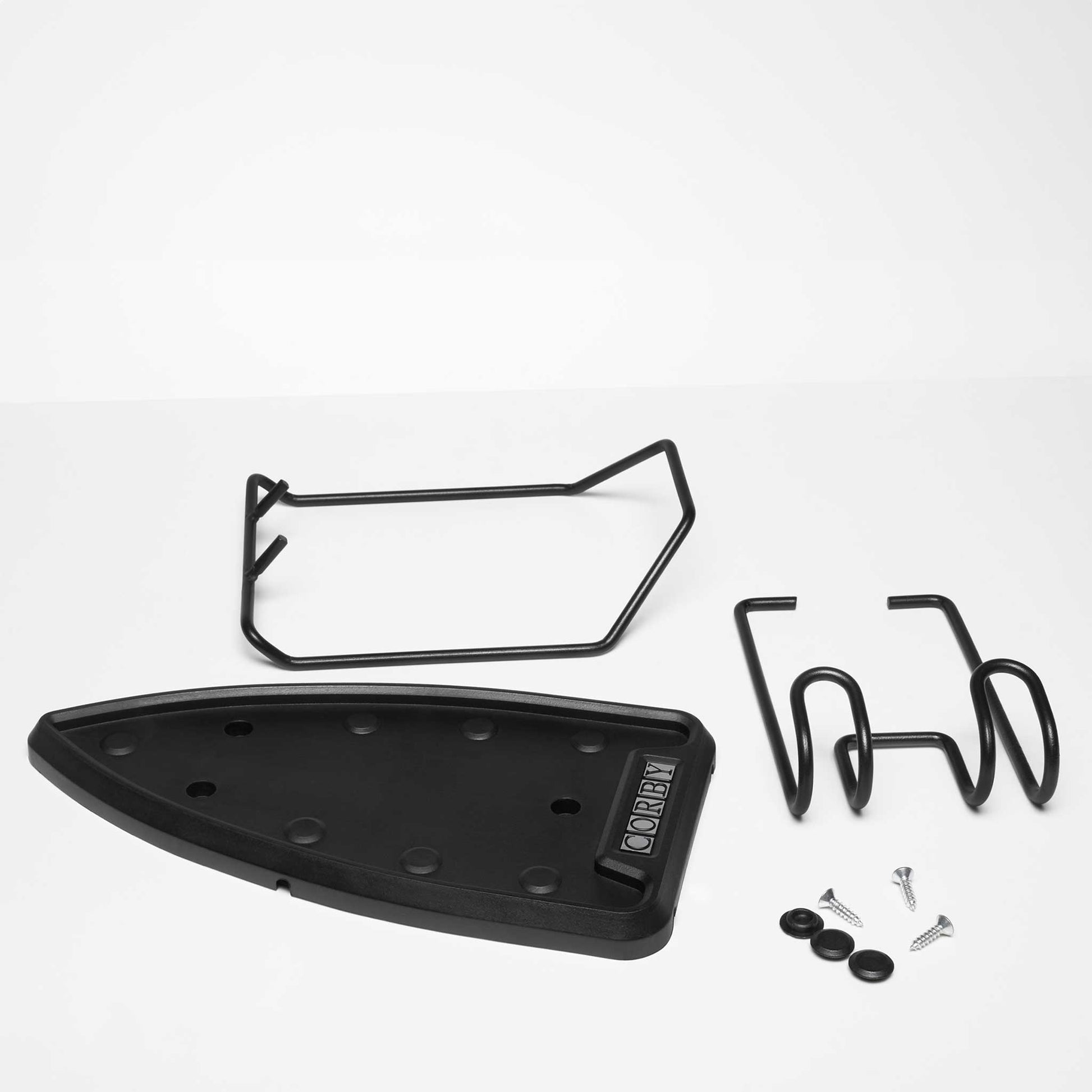 Disassembled Corby Sherwood iron and ironing board holder for 1200W and 1600W hotel irons, showing heat-resistant backing plate, wire arms, screws, and fixings