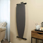 Corby Sherwood dark grey ironing board mounted on wall using branded holder in hotel guest room with coffee tray and armchair