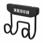 Corby Sherwood ironing board holder with dual wire arms and branded black plastic mounting plate for hotel wardrobes or walls