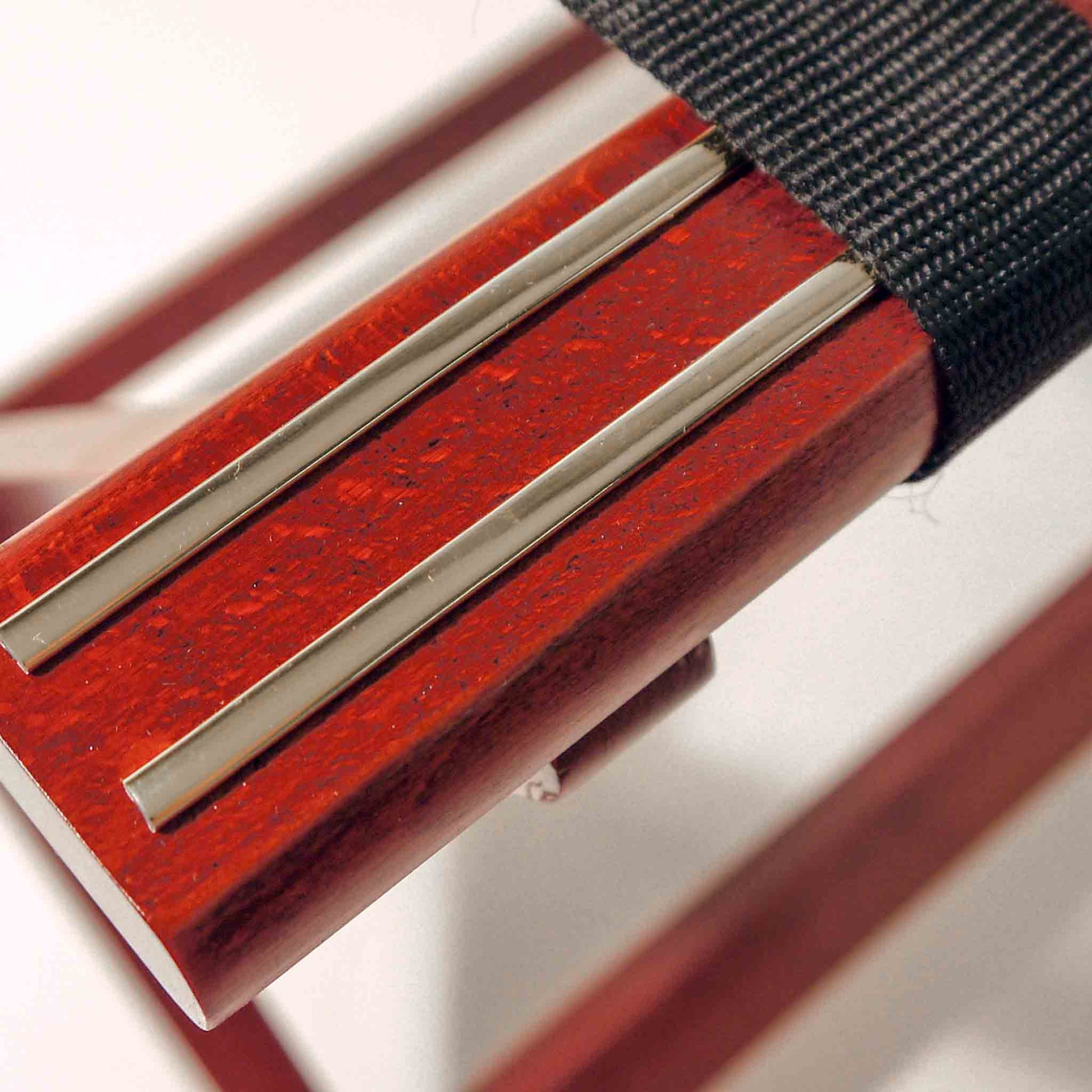Close up of the mahogany wood on york luggage rack