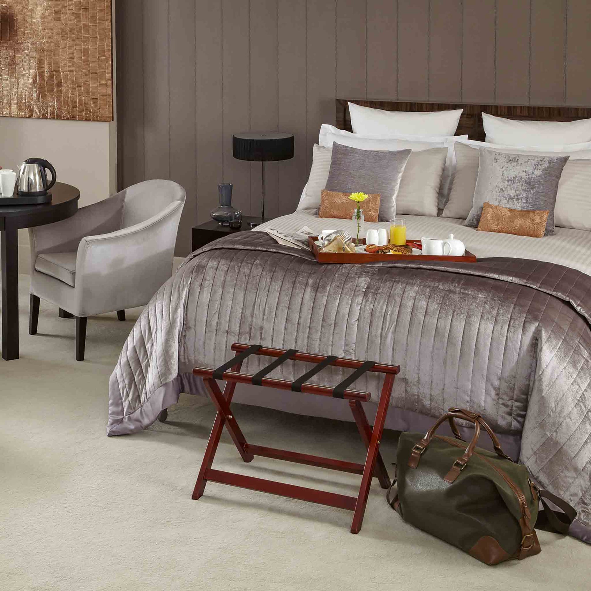 Hotel bedroom with Corby mahogany luggage rack