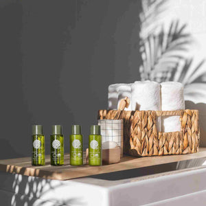 Geneva Green 30ml miniature toiletries range in hotel bathroom