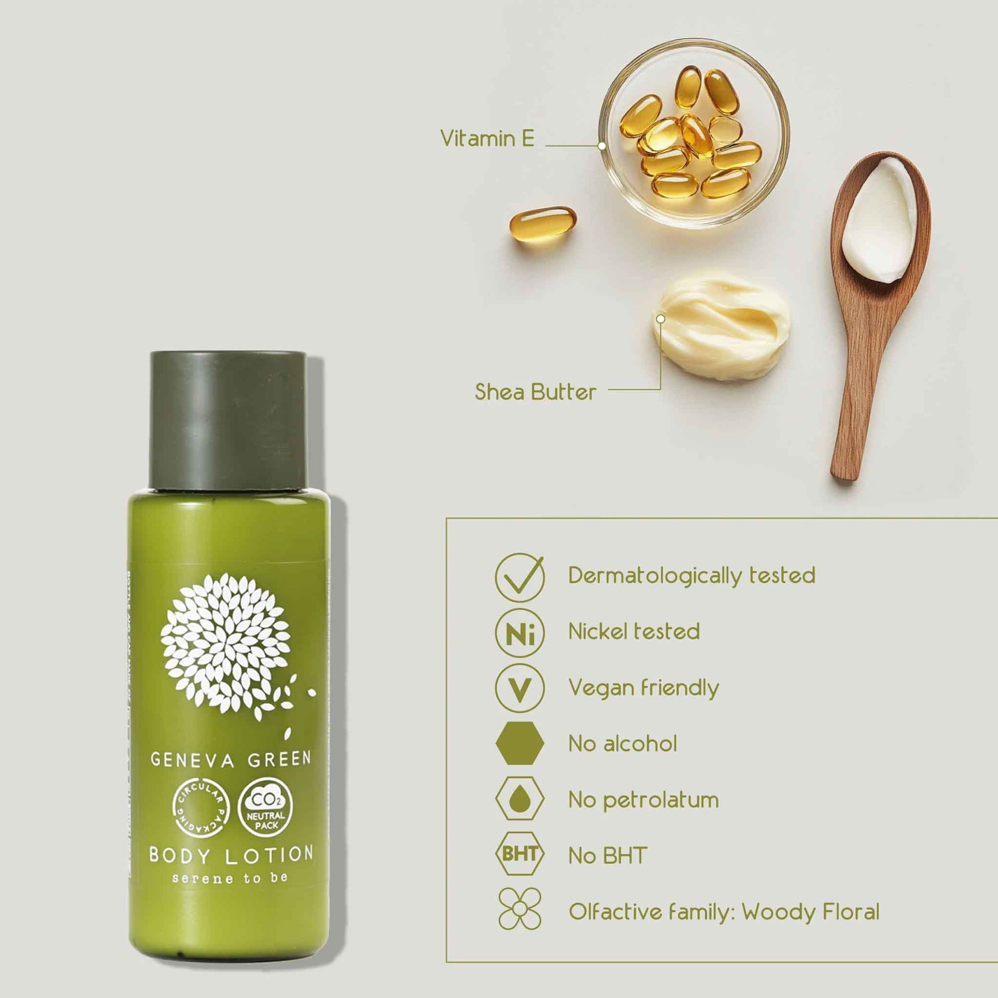 Geneva Green body lotion bottle with shea butter and vitamin E capsules on a light background