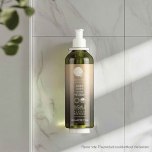 Geneva Green 370ml refillable body wash bottle with pump dispenser mounted on hotel bathroom wall, made from 100% recycled plastic