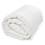 Summer hollowfibre soft to touch 4.5 tog duvet rolled up