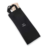 Black canvas newspaper bag with handles and good morning message