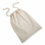 Natural linen drawstring laundry bag with white 'LAUNDRY' embroidered text
