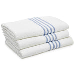 Stack of white leisure and spa towels with blue stripes