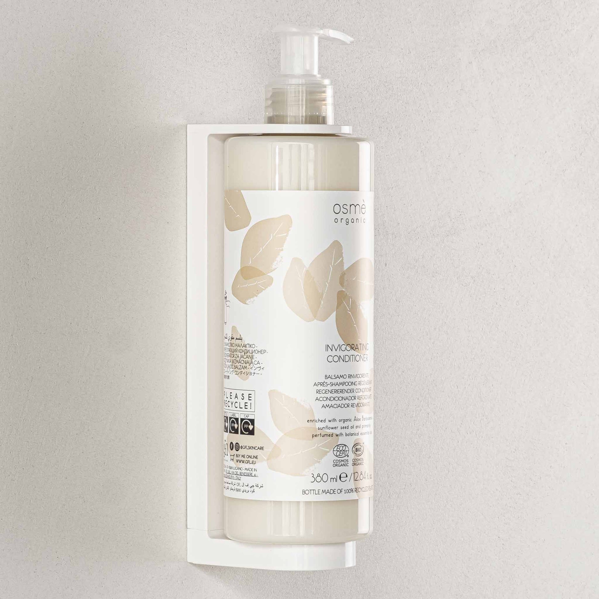 Osme Organic conditioner pump dispenser in wall mounted bracket