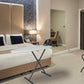 Corby Oxford Premium Ironing Centre with 2000W steam iron set up in modern hotel bedroom with king-size bed and desk area