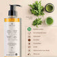 Prija shampoo bottle with green leafy ingredients and certification details on a beige background