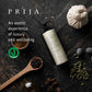 PRIJA product on a dark surface with spices and text about luxury and wellbeing.