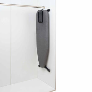 Swirl ironing board folded and stored in hotel wardrobe