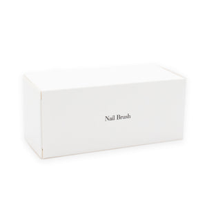 Nail brush in white box, hotel amenities