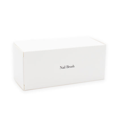 Nail brush in white box, hotel amenities