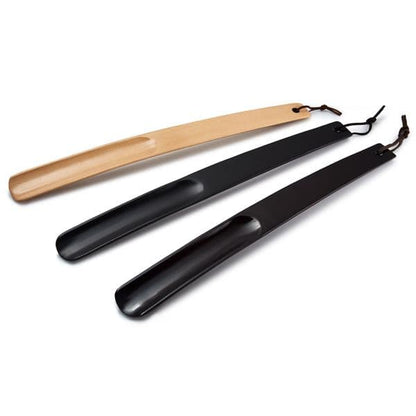 Set of wooden shoe horns in natural, mahogany and black finish